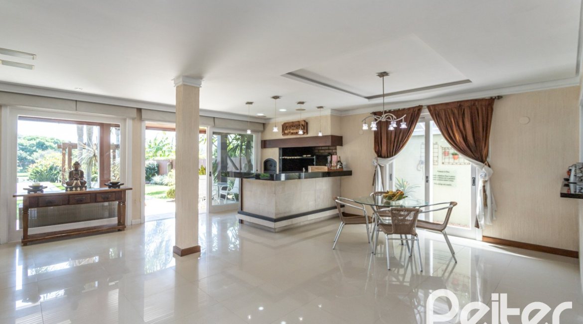 Casa em Condomínio à venda com 386m², 4 dormitórios, 4 suítes, 4 vagas, no bairro Terra Ville em PORTO ALEGRE