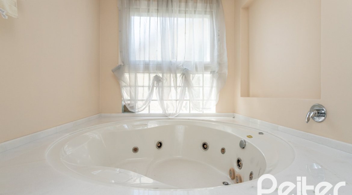 Casa em Condomínio à venda com 386m², 4 dormitórios, 4 suítes, 4 vagas, no bairro Terra Ville em PORTO ALEGRE