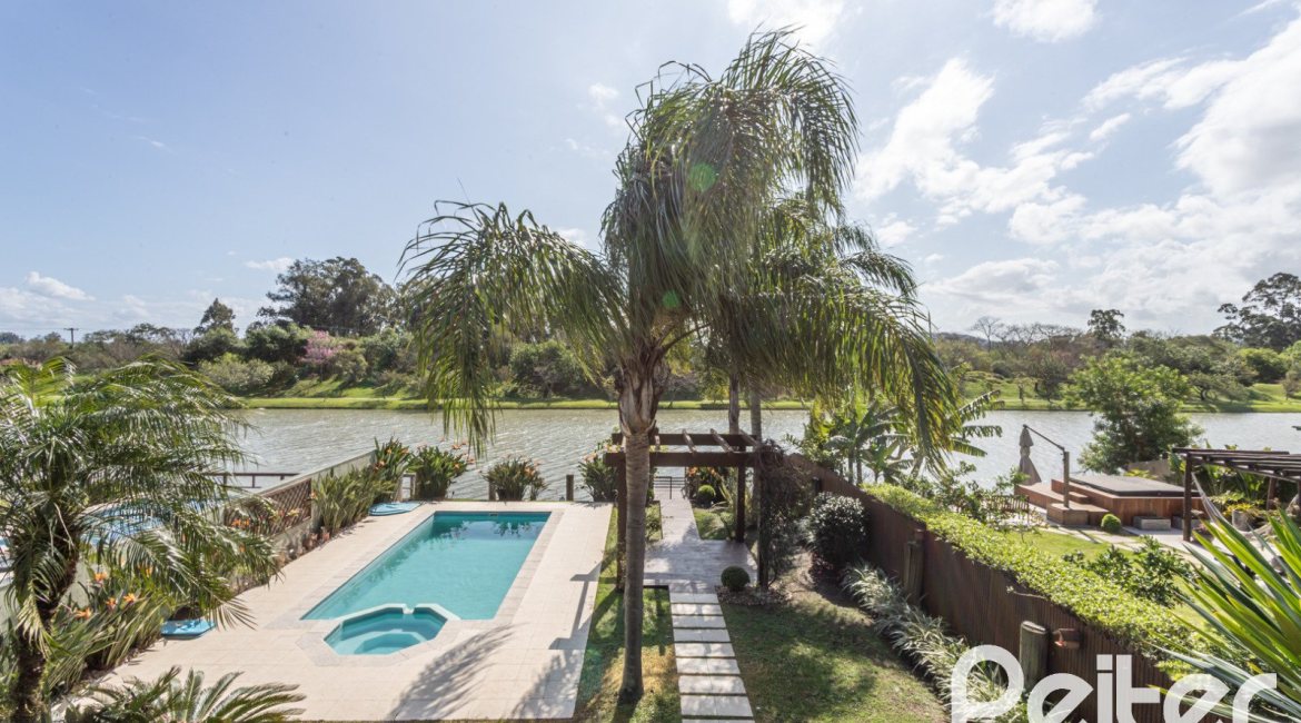 Casa em Condomínio à venda com 386m², 4 dormitórios, 4 suítes, 4 vagas, no bairro Terra Ville em PORTO ALEGRE