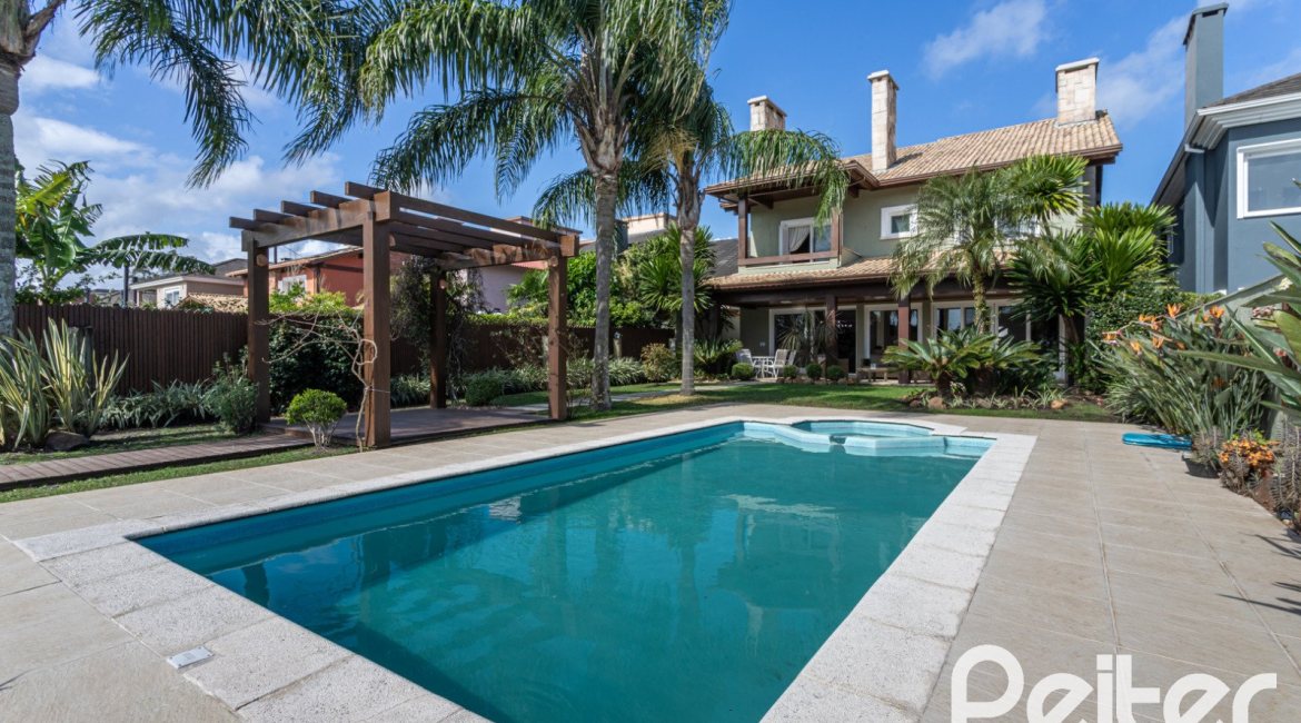 Casa em Condomínio à venda com 386m², 4 dormitórios, 4 suítes, 4 vagas, no bairro Terra Ville em PORTO ALEGRE