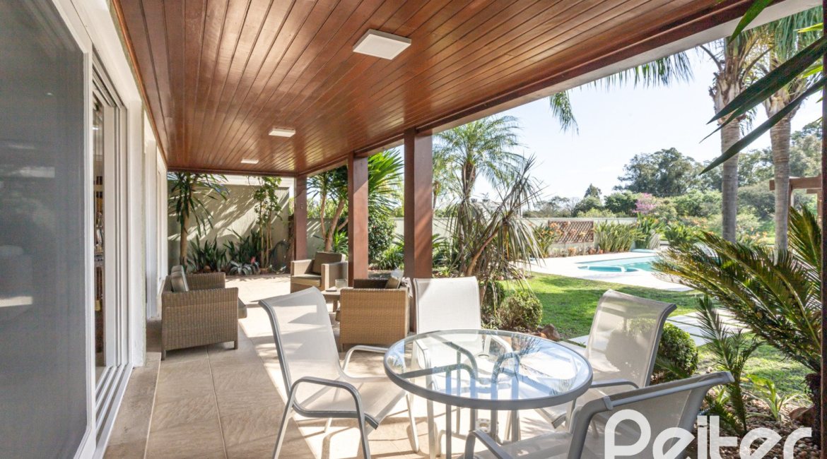 Casa em Condomínio à venda com 386m², 4 dormitórios, 4 suítes, 4 vagas, no bairro Terra Ville em PORTO ALEGRE