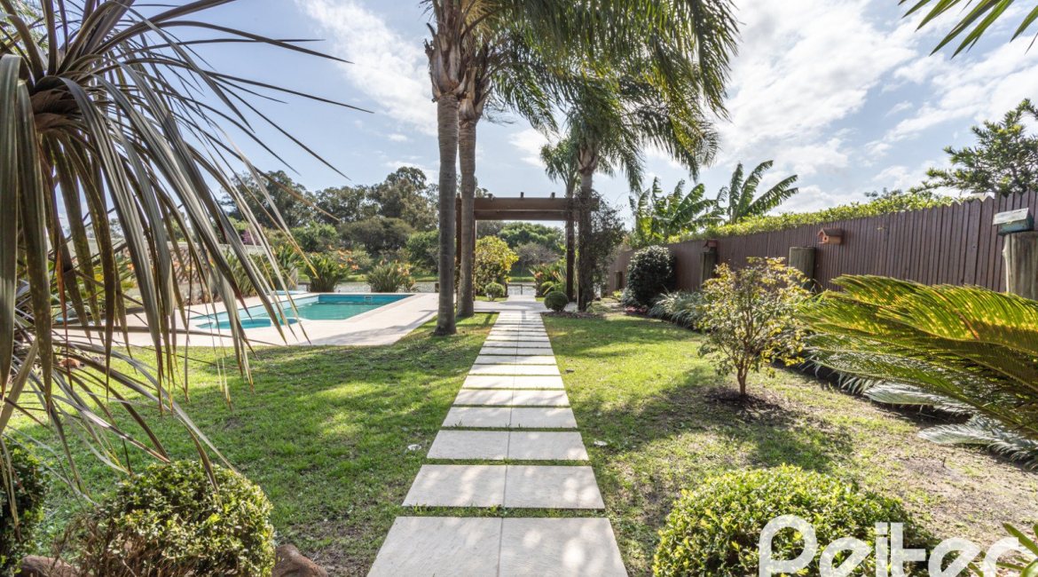 Casa em Condomínio à venda com 386m², 4 dormitórios, 4 suítes, 4 vagas, no bairro Terra Ville em PORTO ALEGRE