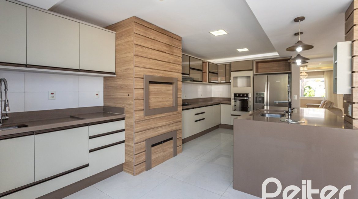 Casa em Condomínio à venda com 312m², 4 dormitórios, 4 suítes, 4 vagas, no bairro Hipica em PORTO ALEGRE