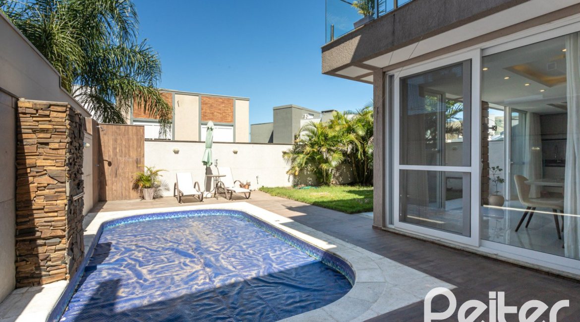 Casa em Condomínio à venda com 312m², 4 dormitórios, 4 suítes, 4 vagas, no bairro Hipica em PORTO ALEGRE