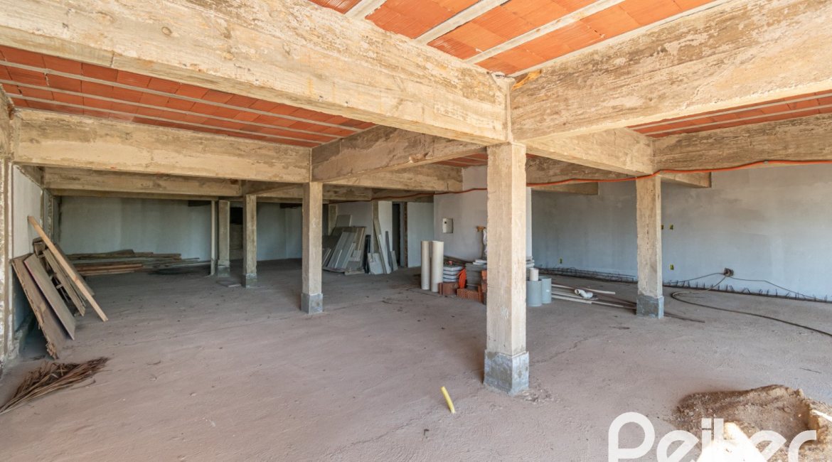 Casa à venda com 450m², 3 dormitórios, 3 suítes, 6 vagas, no bairro Vila Assunção em Porto Alegre