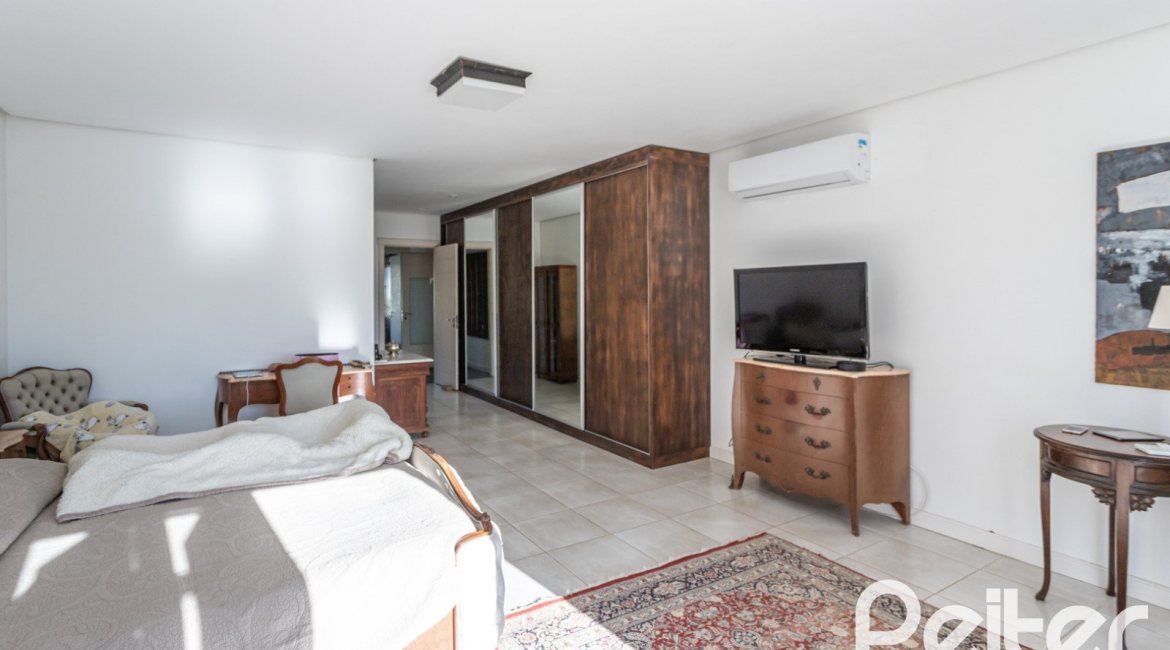 Casa em Condomínio à venda com 276m², 2 dormitórios, 2 suítes, 2 vagas, no bairro Terra Ville em PORTO ALEGRE