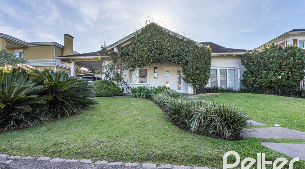 Casa em Condomínio à venda com 276m², 2 dormitórios, 2 suítes, 2 vagas, no bairro Terra Ville em PORTO ALEGRE