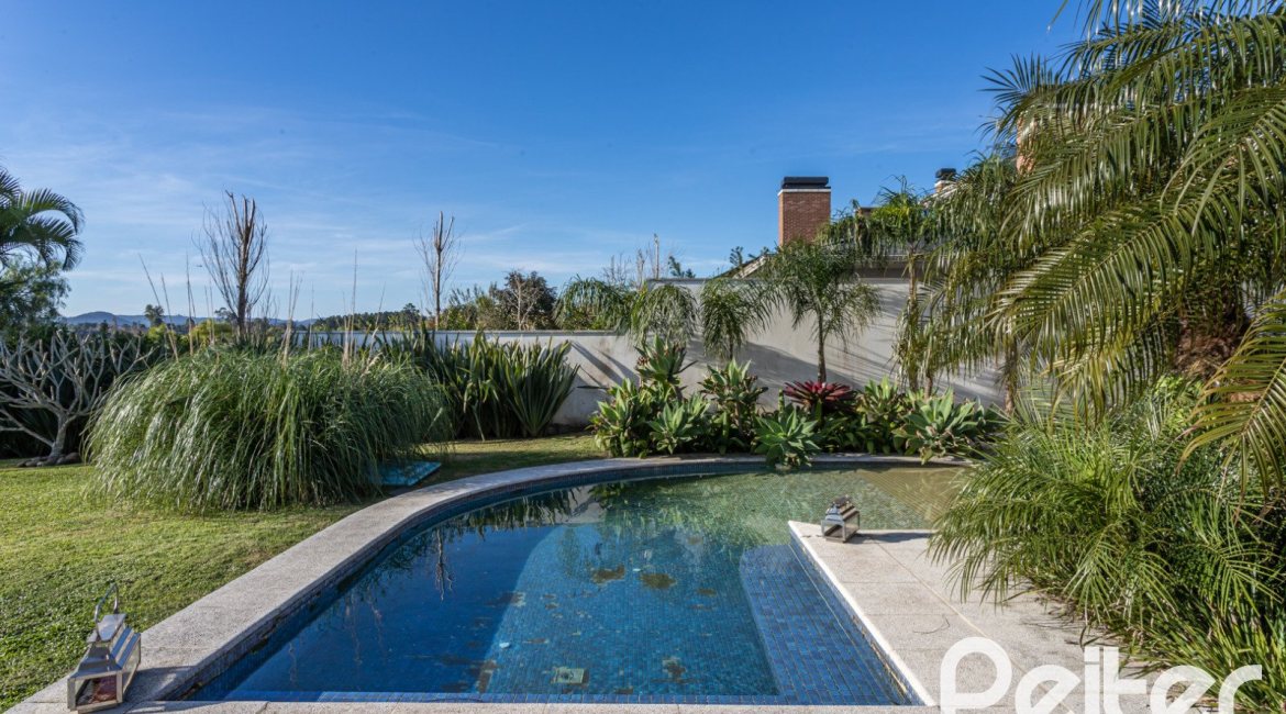 Casa em Condomínio à venda com 276m², 2 dormitórios, 2 suítes, 2 vagas, no bairro Terra Ville em PORTO ALEGRE