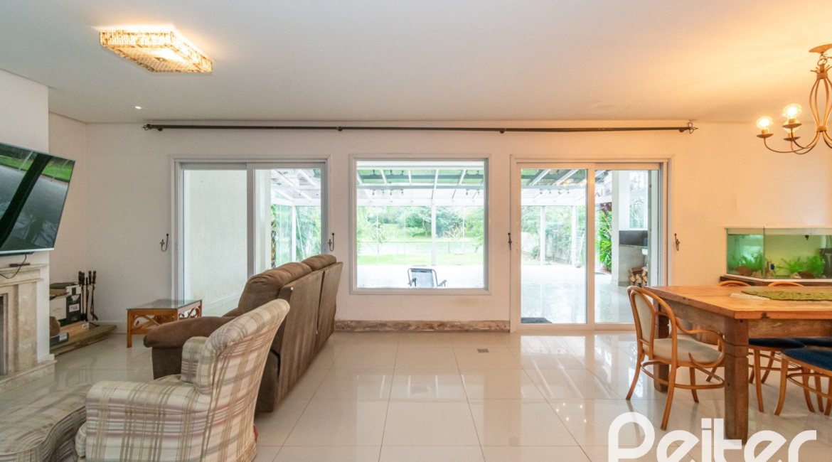 Casa em Condomínio à venda com 333m², 3 dormitórios, 3 suítes, 4 vagas, no bairro Terra Ville em PORTO ALEGRE