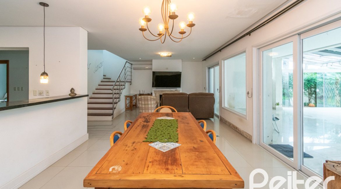 Casa em Condomínio à venda com 333m², 3 dormitórios, 3 suítes, 4 vagas, no bairro Terra Ville em PORTO ALEGRE