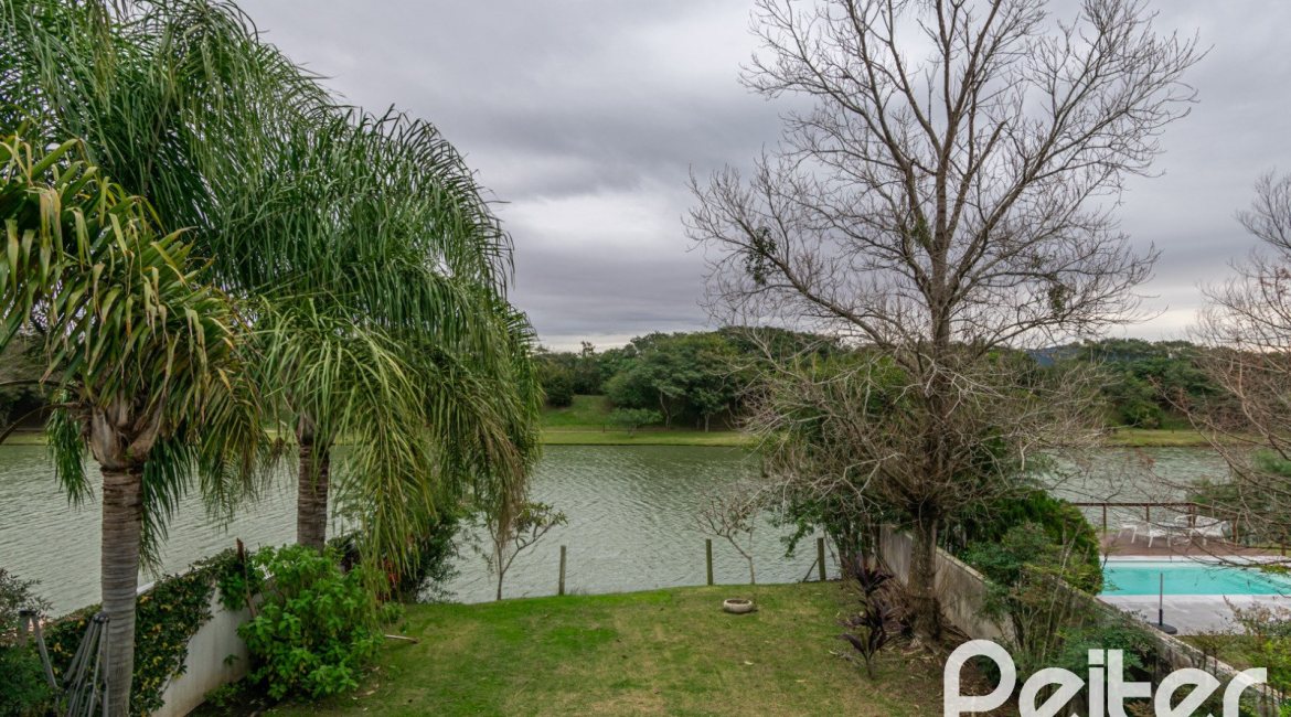 Casa em Condomínio à venda com 333m², 3 dormitórios, 3 suítes, 4 vagas, no bairro Terra Ville em PORTO ALEGRE