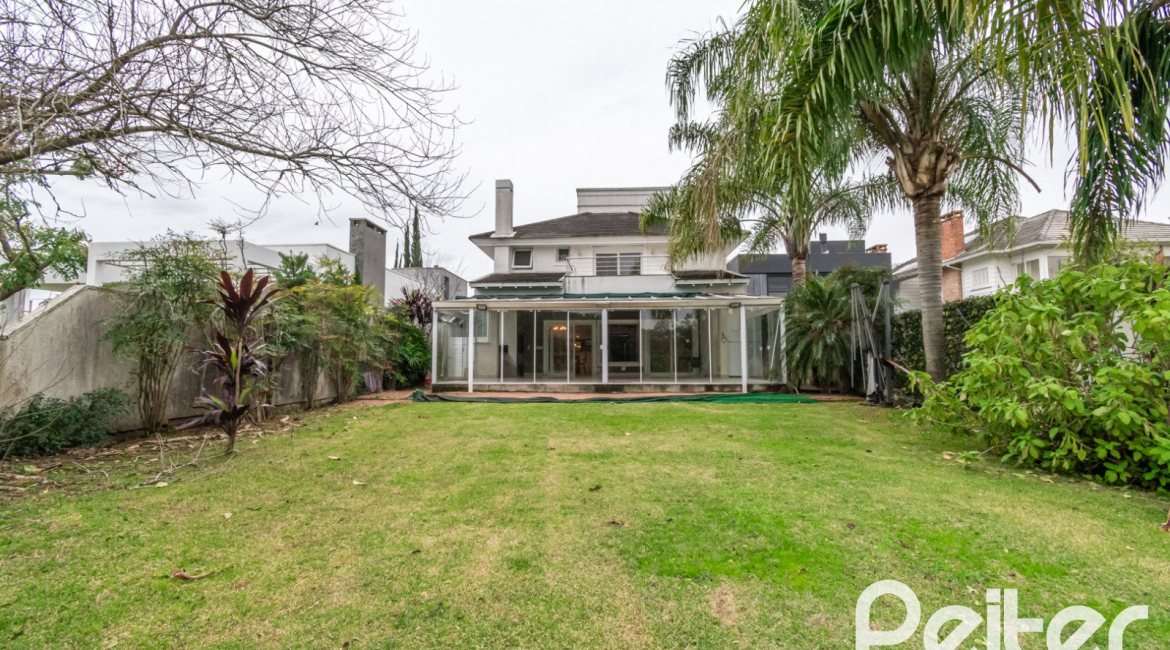 Casa em Condomínio à venda com 333m², 3 dormitórios, 3 suítes, 4 vagas, no bairro Terra Ville em PORTO ALEGRE