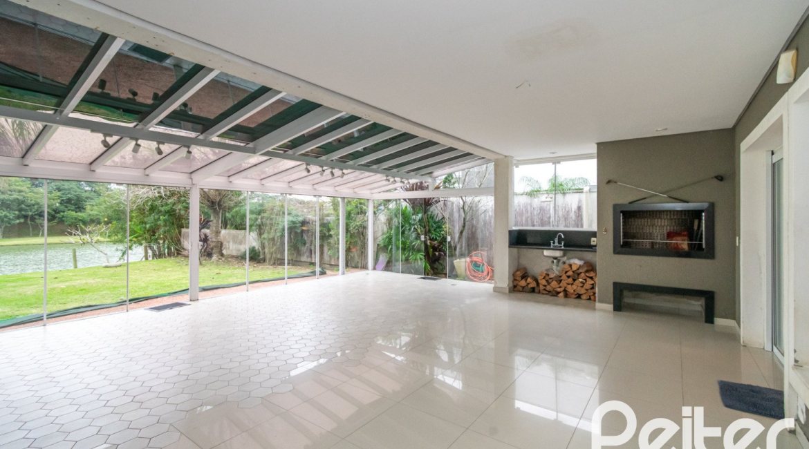 Casa em Condomínio à venda com 333m², 3 dormitórios, 3 suítes, 4 vagas, no bairro Terra Ville em PORTO ALEGRE