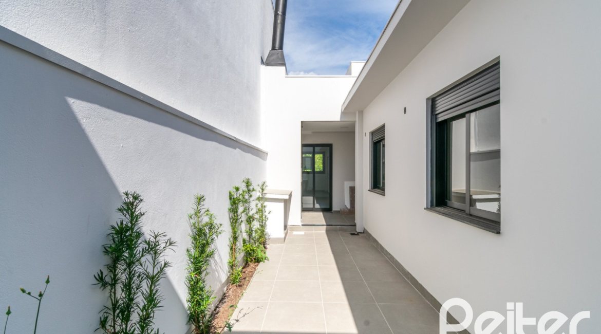 Casa em Condomínio à venda com 93m², 3 dormitórios, 1 suíte, 2 vagas, no bairro Hípica em Porto Alegre