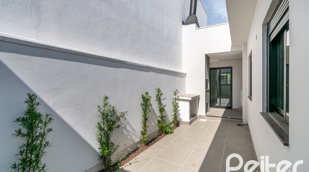 Casa em Condomínio à venda com 93m², 3 dormitórios, 1 suíte, 2 vagas, no bairro Hípica em Porto Alegre