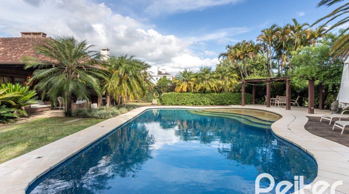 Casa em Condomínio à venda com 290m², 3 dormitórios, 3 suítes, 4 vagas, no bairro Terra Ville em PORTO ALEGRE