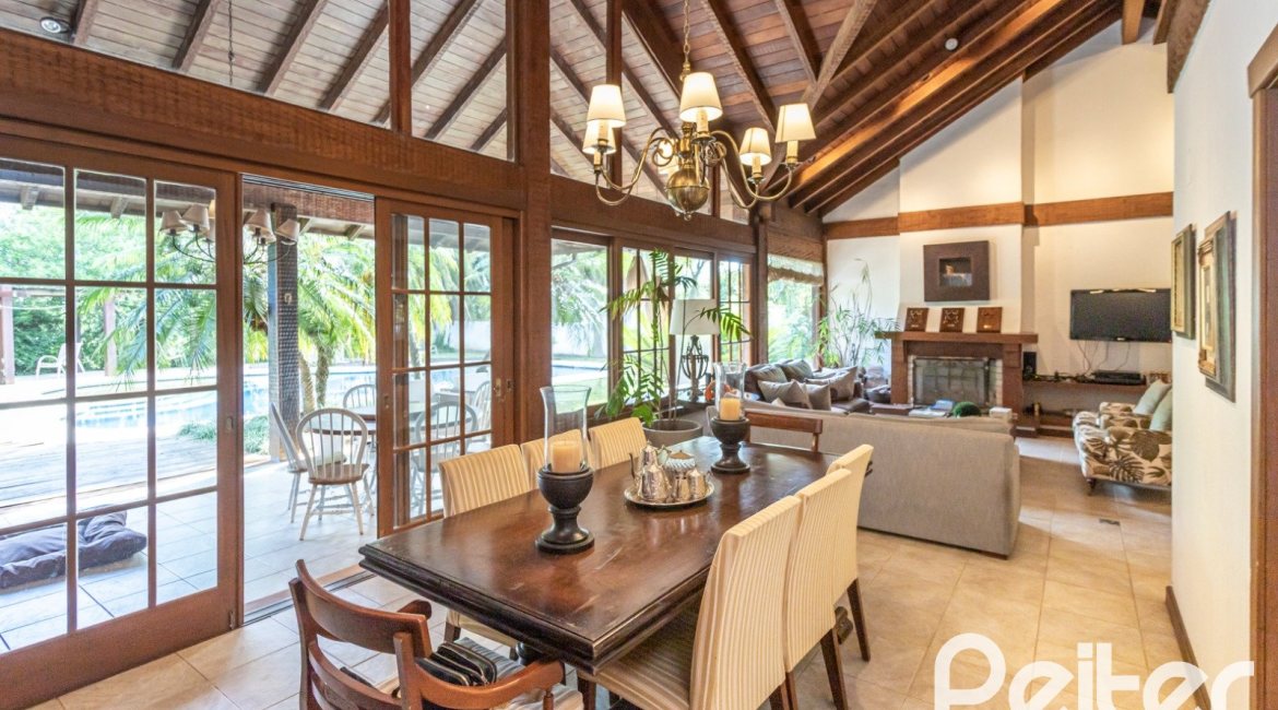 Casa em Condomínio à venda com 290m², 3 dormitórios, 3 suítes, 4 vagas, no bairro Terra Ville em PORTO ALEGRE