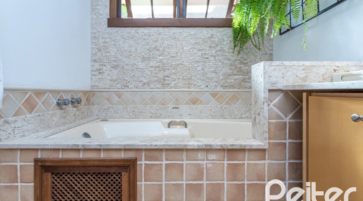 Casa em Condomínio à venda com 290m², 3 dormitórios, 3 suítes, 4 vagas, no bairro Terra Ville em PORTO ALEGRE