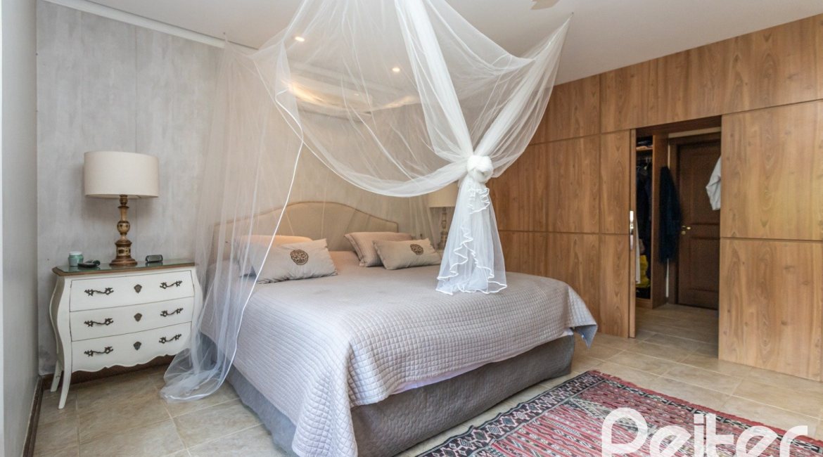 Casa em Condomínio à venda com 290m², 3 dormitórios, 3 suítes, 4 vagas, no bairro Terra Ville em PORTO ALEGRE