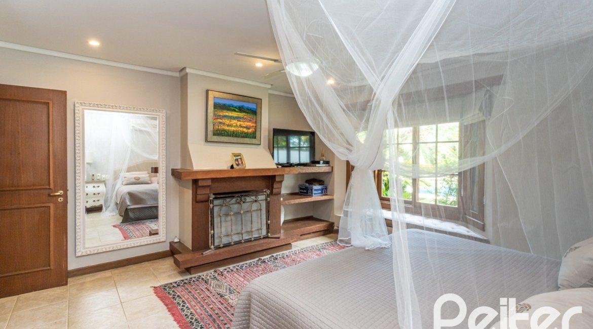 Casa em Condomínio à venda com 290m², 3 dormitórios, 3 suítes, 4 vagas, no bairro Terra Ville em PORTO ALEGRE