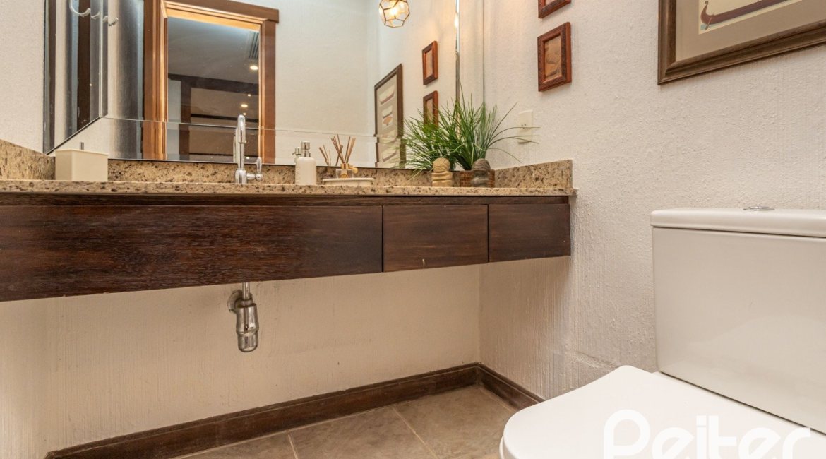 Casa em Condomínio à venda com 290m², 3 dormitórios, 3 suítes, 4 vagas, no bairro Terra Ville em PORTO ALEGRE