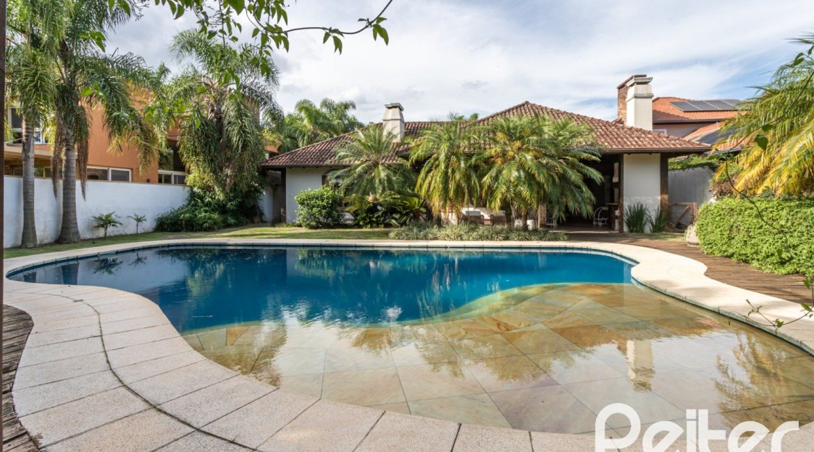 Casa em Condomínio à venda com 290m², 3 dormitórios, 3 suítes, 4 vagas, no bairro Terra Ville em PORTO ALEGRE