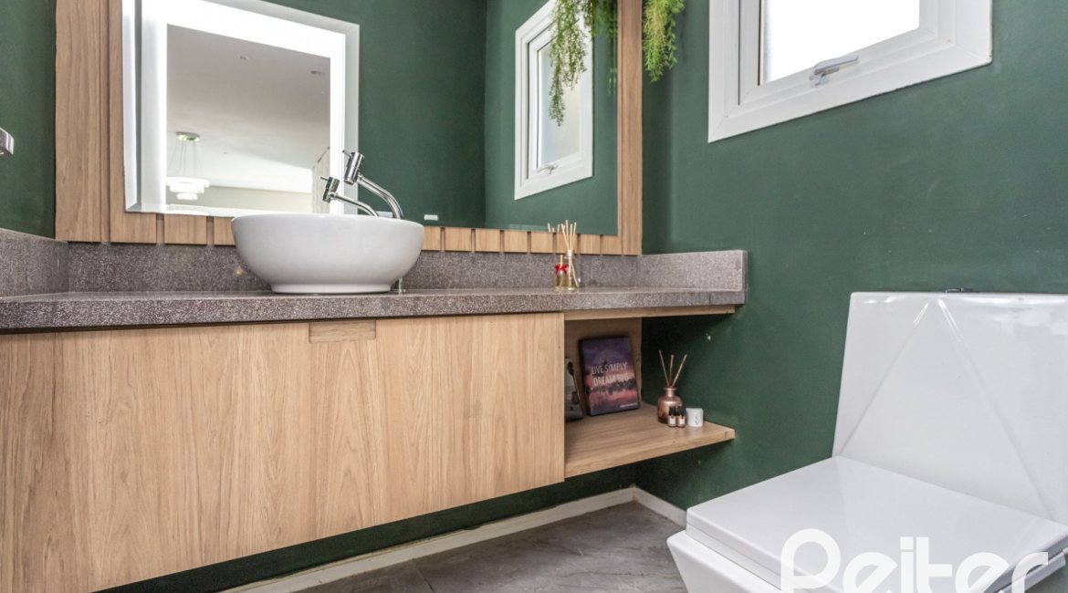 Casa em Condomínio à venda com 248m², 3 dormitórios, 2 suítes, 2 vagas, no bairro Alphaville em PORTO ALEGRE