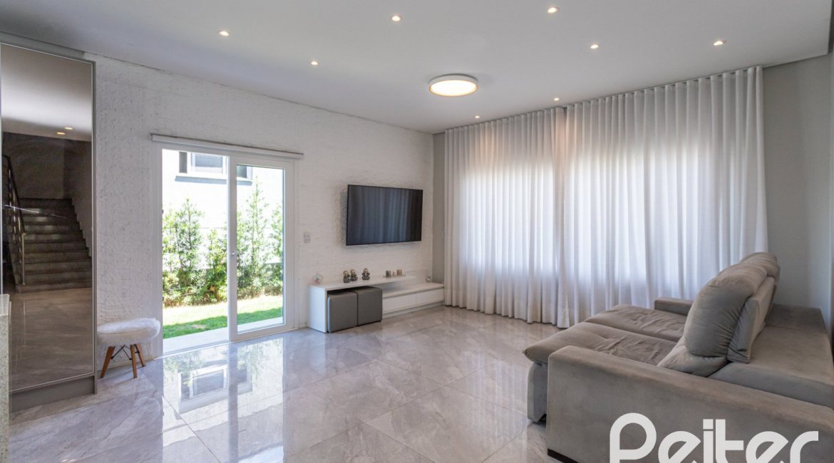 Casa em Condomínio à venda com 248m², 3 dormitórios, 2 suítes, 2 vagas, no bairro Alphaville em PORTO ALEGRE