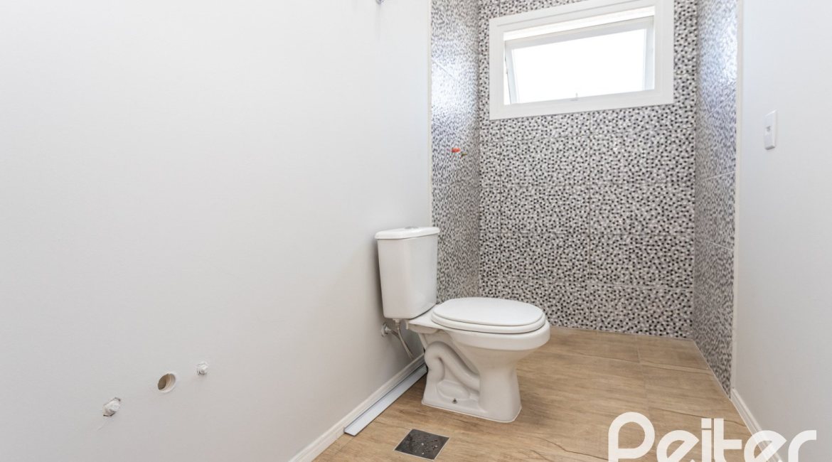 Casa em Condomínio à venda com 248m², 3 dormitórios, 2 suítes, 2 vagas, no bairro Alphaville em PORTO ALEGRE