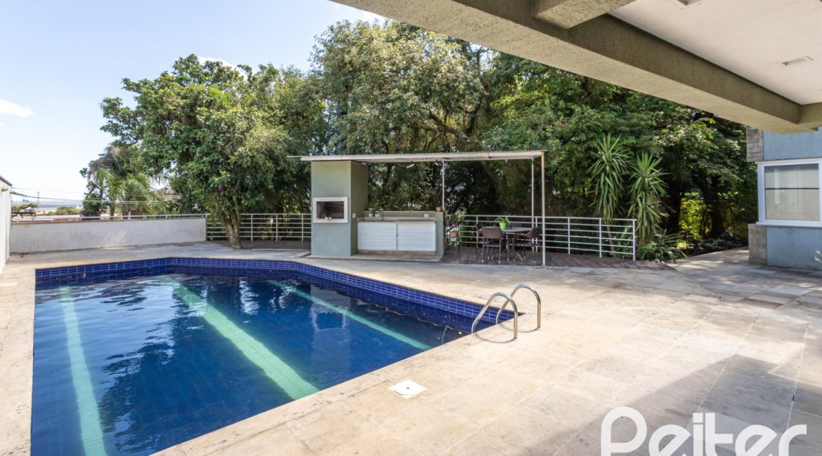 Casa à venda com 547m², 4 dormitórios, 4 suítes, 4 vagas, no bairro Vila Assunção em Porto Alegre
