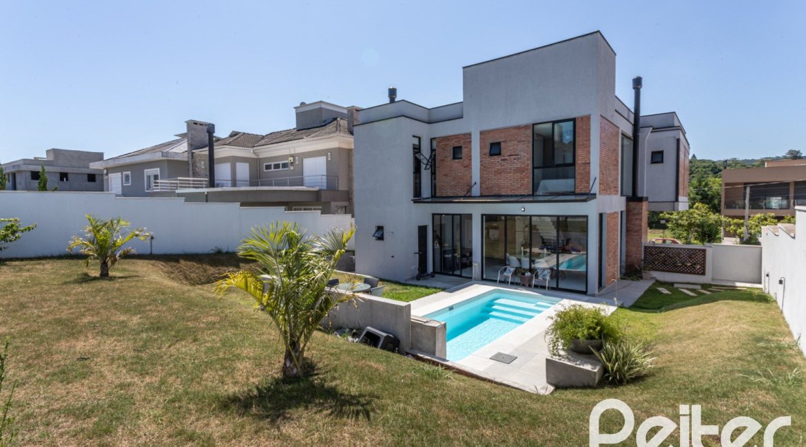 Casa em Condomínio à venda com 263m², 4 dormitórios, 4 suítes, 2 vagas, no bairro Alphaville em PORTO ALEGRE