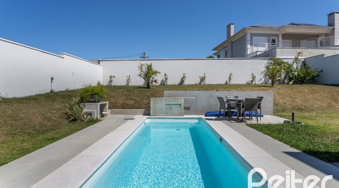 Casa em Condomínio à venda com 263m², 4 dormitórios, 4 suítes, 2 vagas, no bairro Alphaville em PORTO ALEGRE