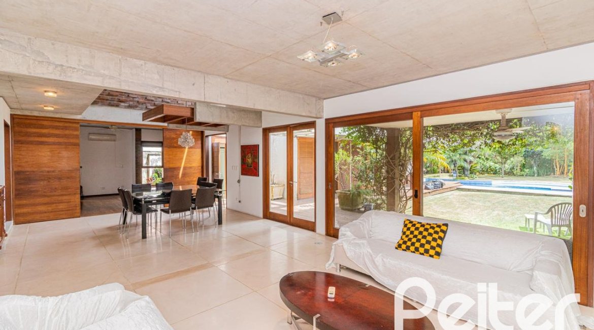 Casa em Condomínio à venda com 435m², 4 dormitórios, 3 suítes, 4 vagas, no bairro Terra Ville em PORTO ALEGRE