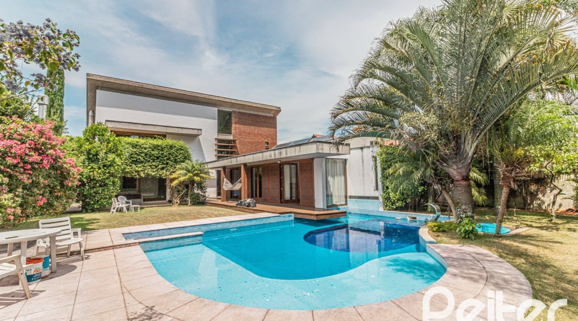 Casa em Condomínio à venda com 435m², 4 dormitórios, 3 suítes, 4 vagas, no bairro Terra Ville em PORTO ALEGRE