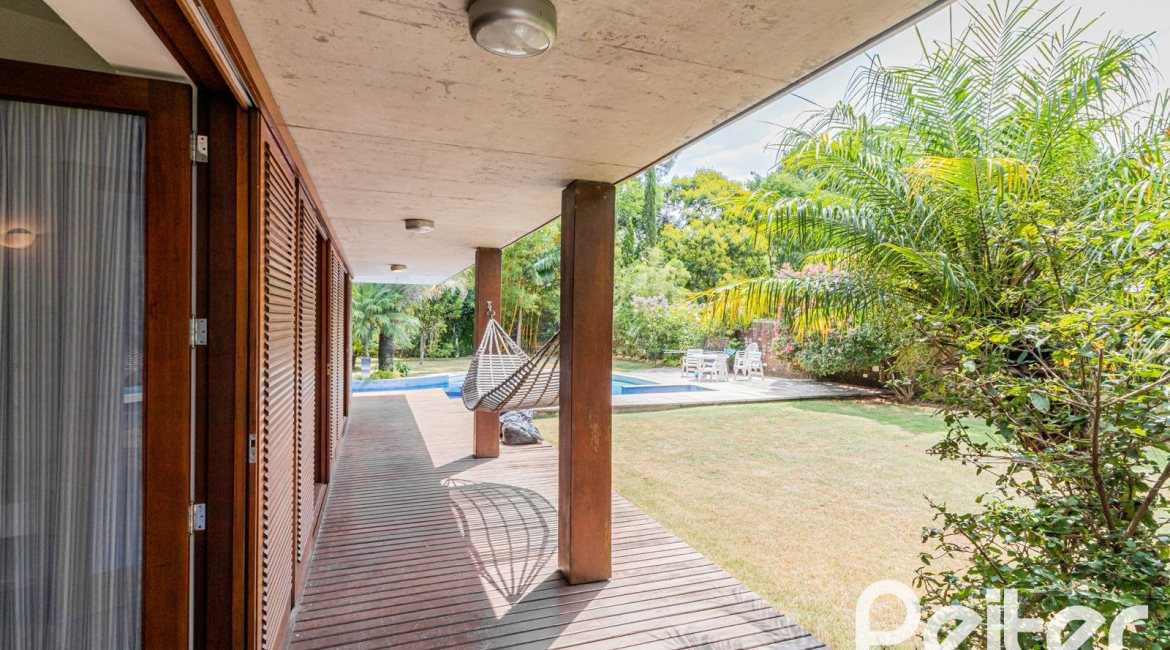Casa em Condomínio à venda com 435m², 4 dormitórios, 3 suítes, 4 vagas, no bairro Terra Ville em PORTO ALEGRE