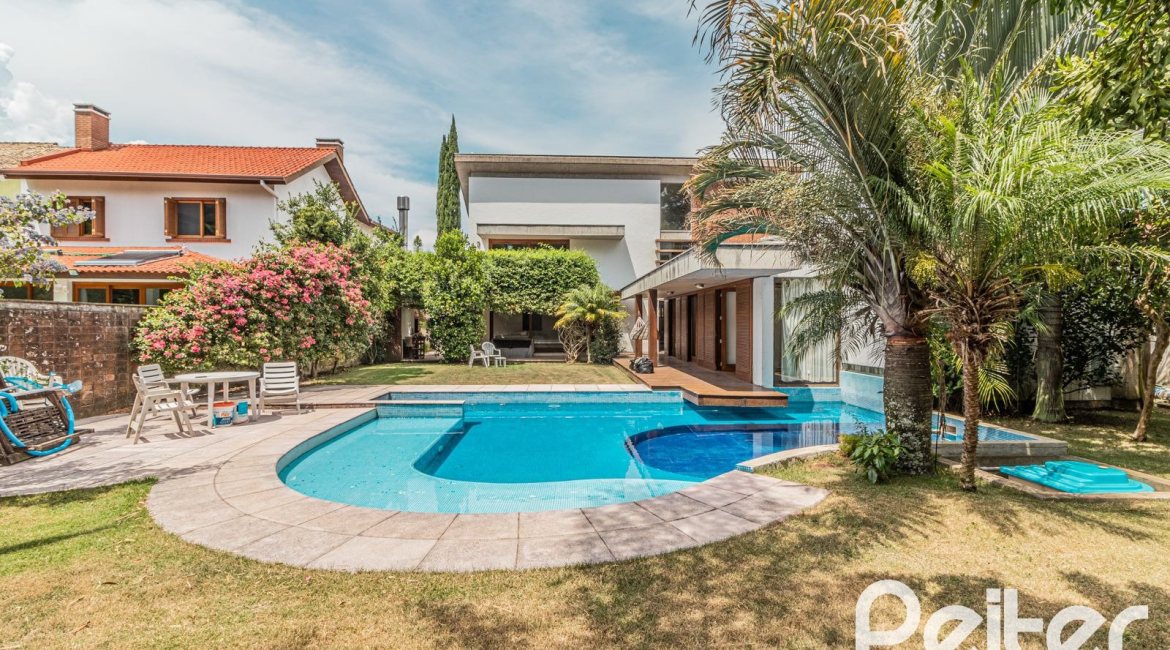 Casa em Condomínio à venda com 435m², 4 dormitórios, 3 suítes, 4 vagas, no bairro Terra Ville em PORTO ALEGRE