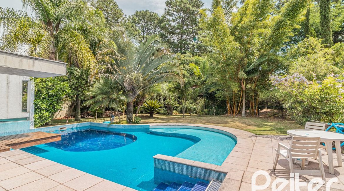 Casa em Condomínio à venda com 435m², 4 dormitórios, 3 suítes, 4 vagas, no bairro Terra Ville em PORTO ALEGRE
