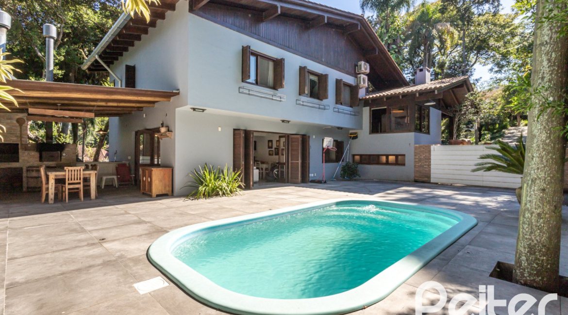 Casa em Condomínio à venda com 282m², 3 dormitórios, 1 suíte, 3 vagas, no bairro Cavalhada em PORTO ALEGRE