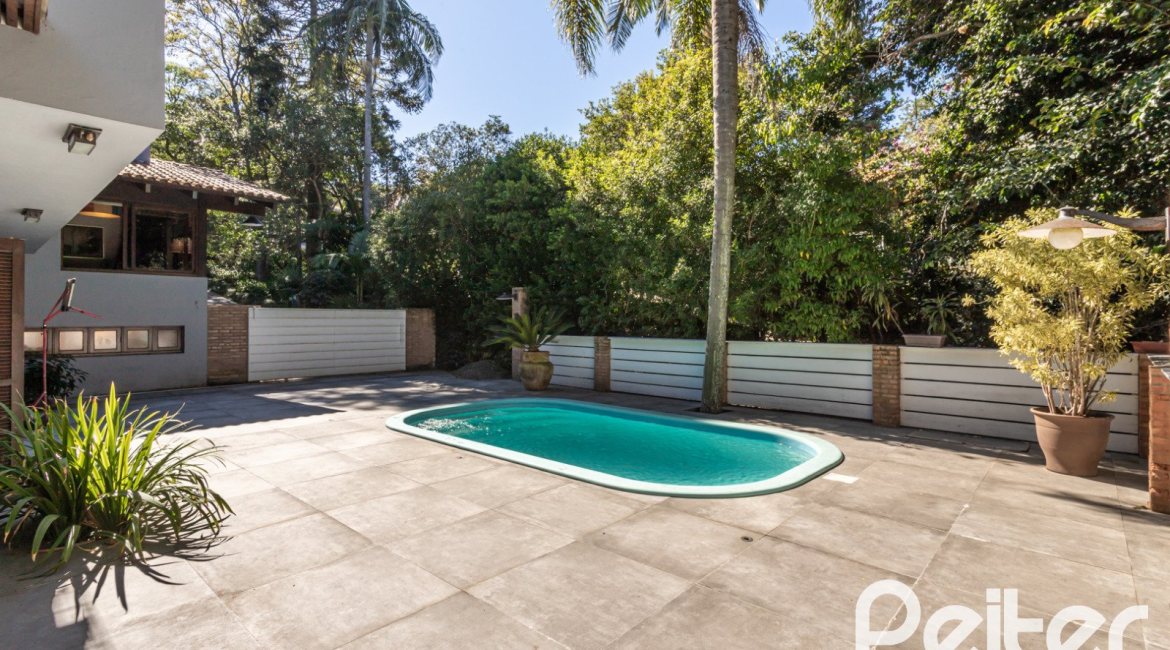 Casa em Condomínio à venda com 282m², 3 dormitórios, 1 suíte, 3 vagas, no bairro Cavalhada em PORTO ALEGRE