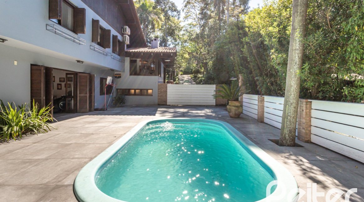 Casa em Condomínio à venda com 282m², 3 dormitórios, 1 suíte, 3 vagas, no bairro Cavalhada em PORTO ALEGRE