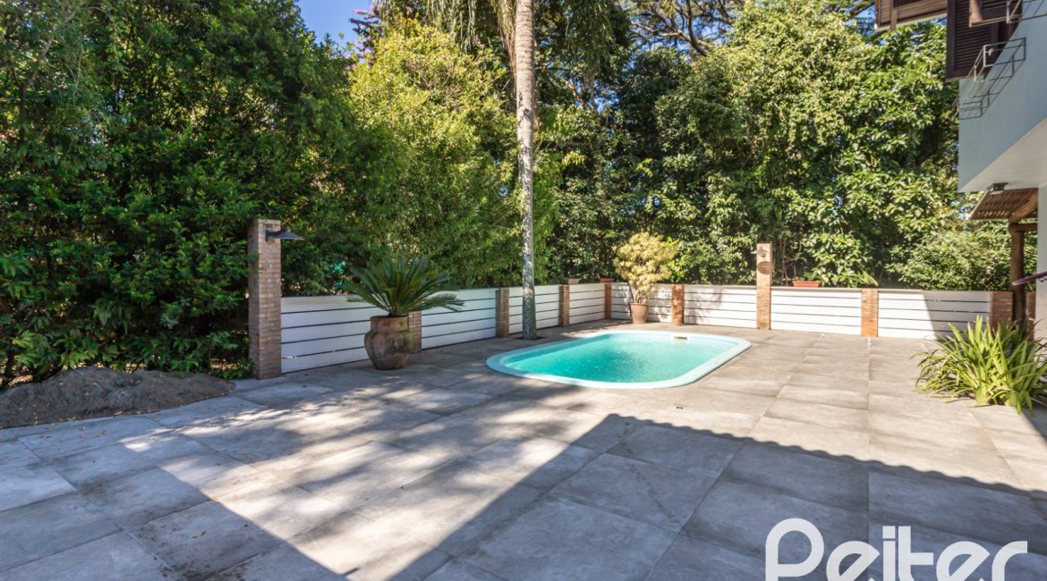 Casa em Condomínio à venda com 282m², 3 dormitórios, 1 suíte, 3 vagas, no bairro Cavalhada em PORTO ALEGRE