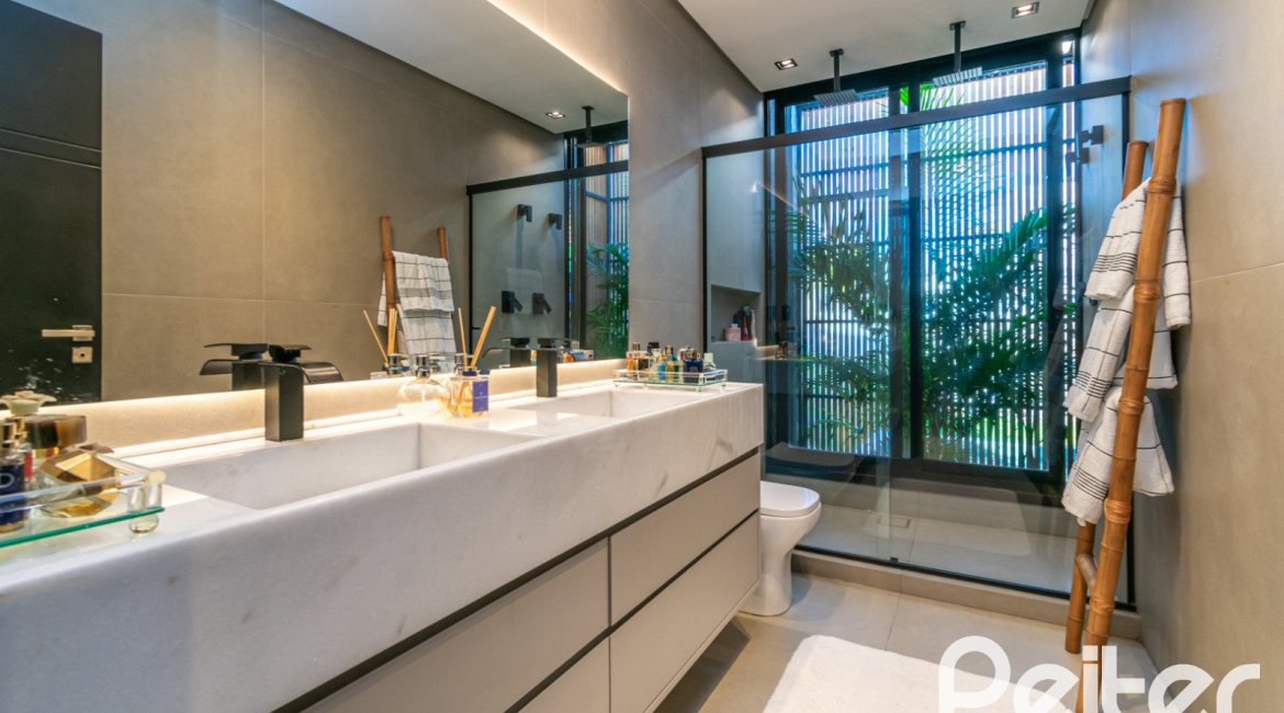 Casa em Condomínio à venda com 260m², 3 dormitórios, 3 suítes, 4 vagas, no bairro Alphaville em PORTO ALEGRE