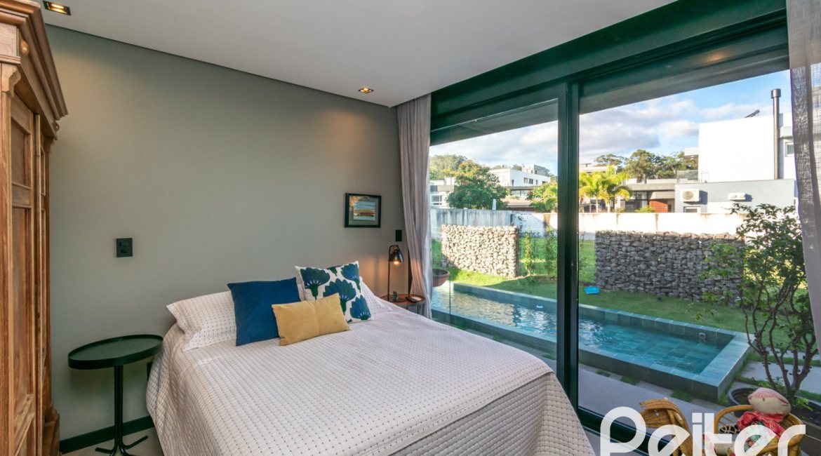 Casa em Condomínio à venda com 260m², 3 dormitórios, 3 suítes, 4 vagas, no bairro Alphaville em PORTO ALEGRE