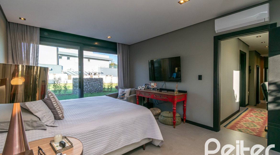 Casa em Condomínio à venda com 260m², 3 dormitórios, 3 suítes, 4 vagas, no bairro Alphaville em PORTO ALEGRE