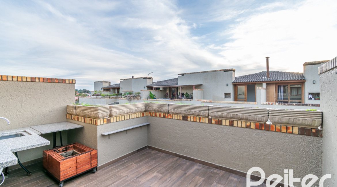 Casa em Condomínio à venda com 102m², 2 dormitórios, 1 suíte, 1 vaga, no bairro Guarujá em Porto Alegre