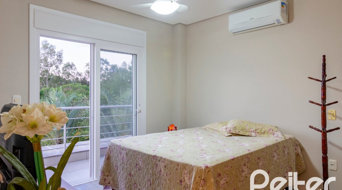 Casa em Condomínio à venda com 308m², 3 dormitórios, 3 suítes, 2 vagas, no bairro Alphaville em PORTO ALEGRE