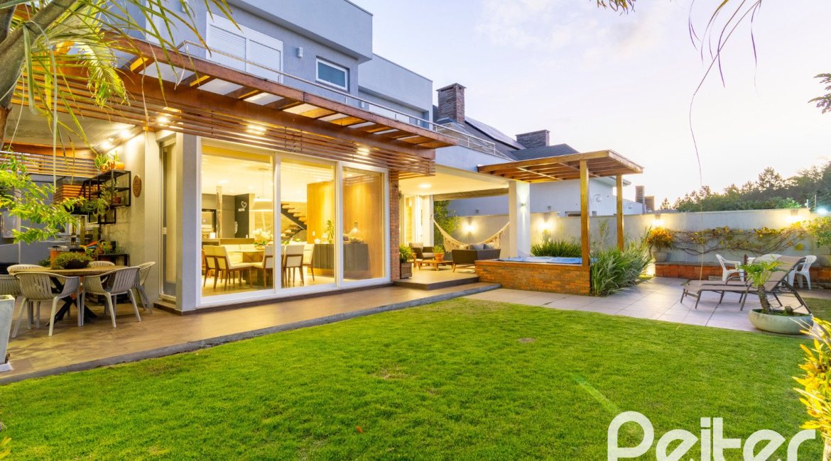 Casa em Condomínio à venda com 308m², 3 dormitórios, 3 suítes, 2 vagas, no bairro Alphaville em PORTO ALEGRE