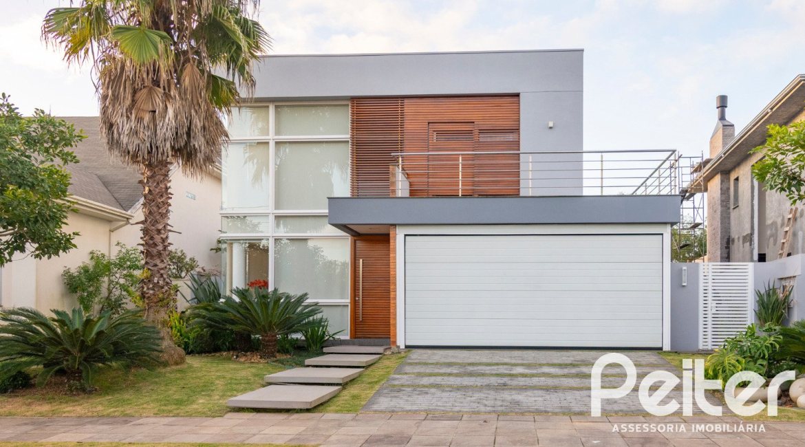 Casa em Condomínio à venda com 308m², 3 dormitórios, 3 suítes, 2 vagas, no bairro Alphaville em PORTO ALEGRE