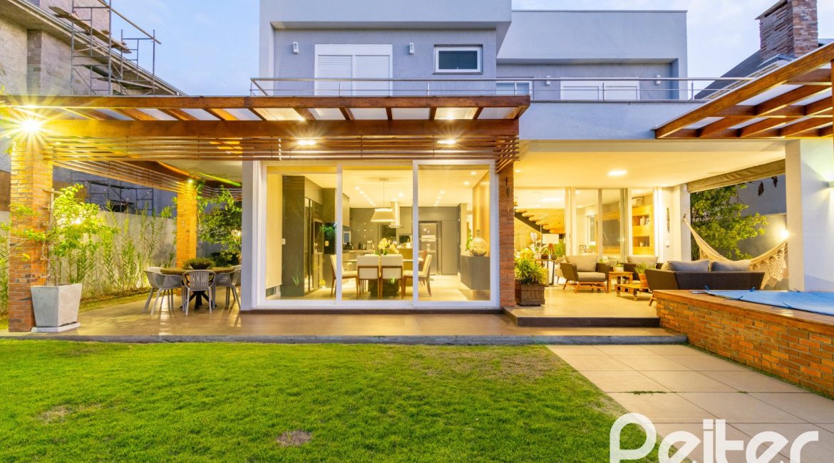 Casa em Condomínio à venda com 308m², 3 dormitórios, 3 suítes, 2 vagas, no bairro Alphaville em PORTO ALEGRE