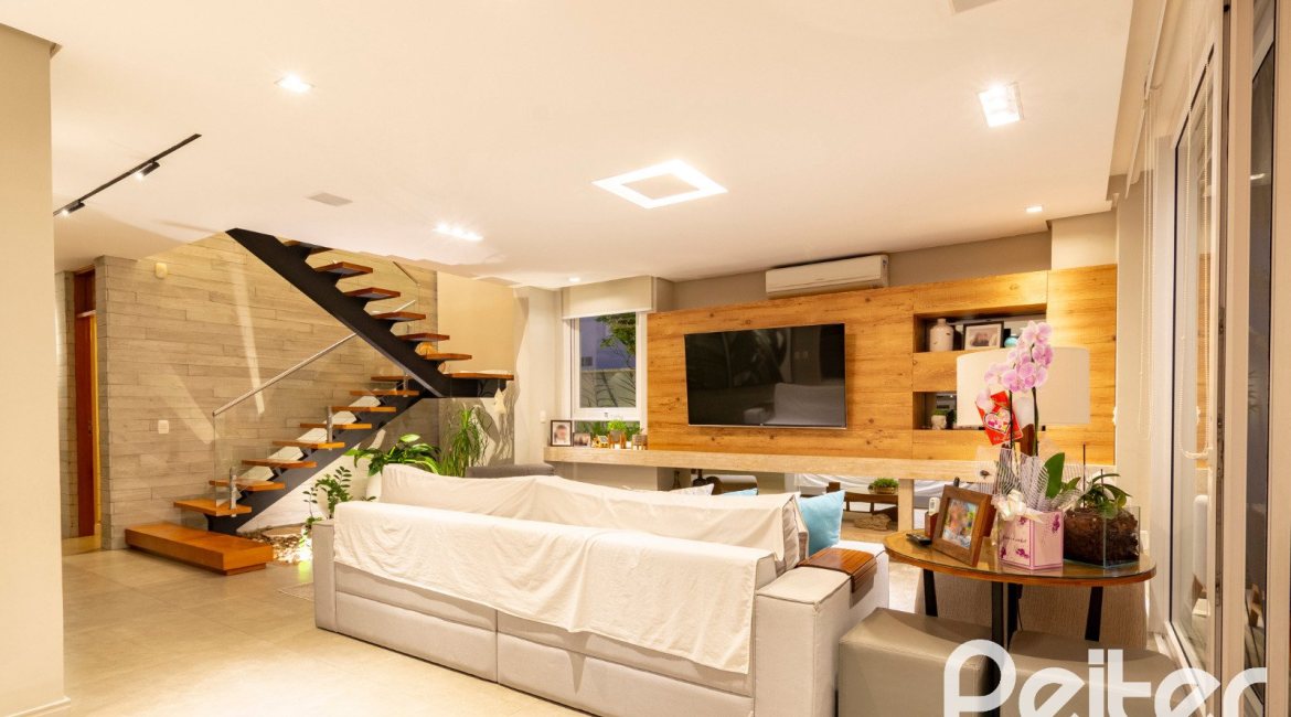 Casa em Condomínio à venda com 308m², 3 dormitórios, 3 suítes, 2 vagas, no bairro Alphaville em PORTO ALEGRE